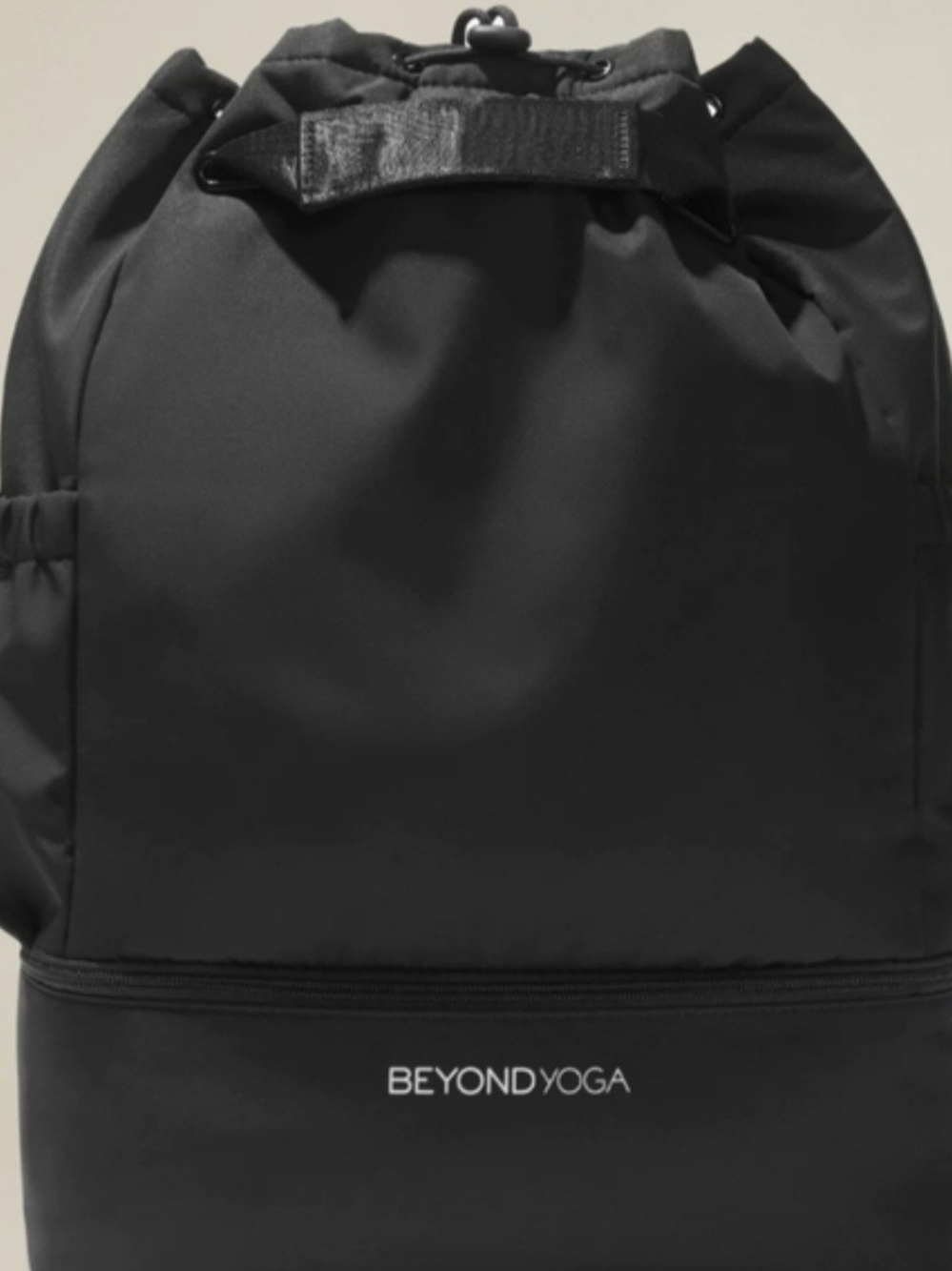 Beyond Yoga Black Drawstring Women’s Backpack with Lower Zip Pocket